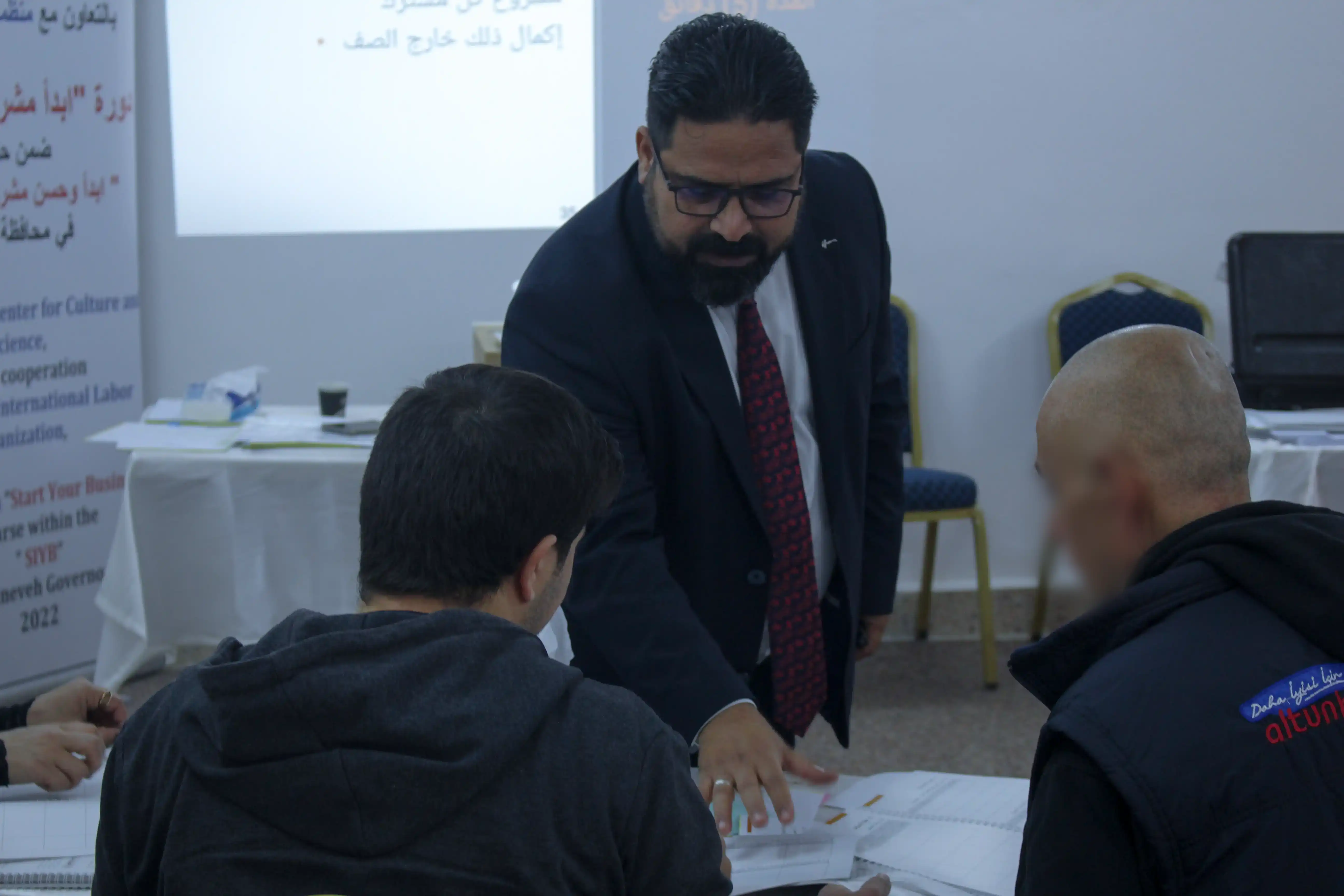 yahya abed mahgoob capacity building a group of beneficiaries in mosul